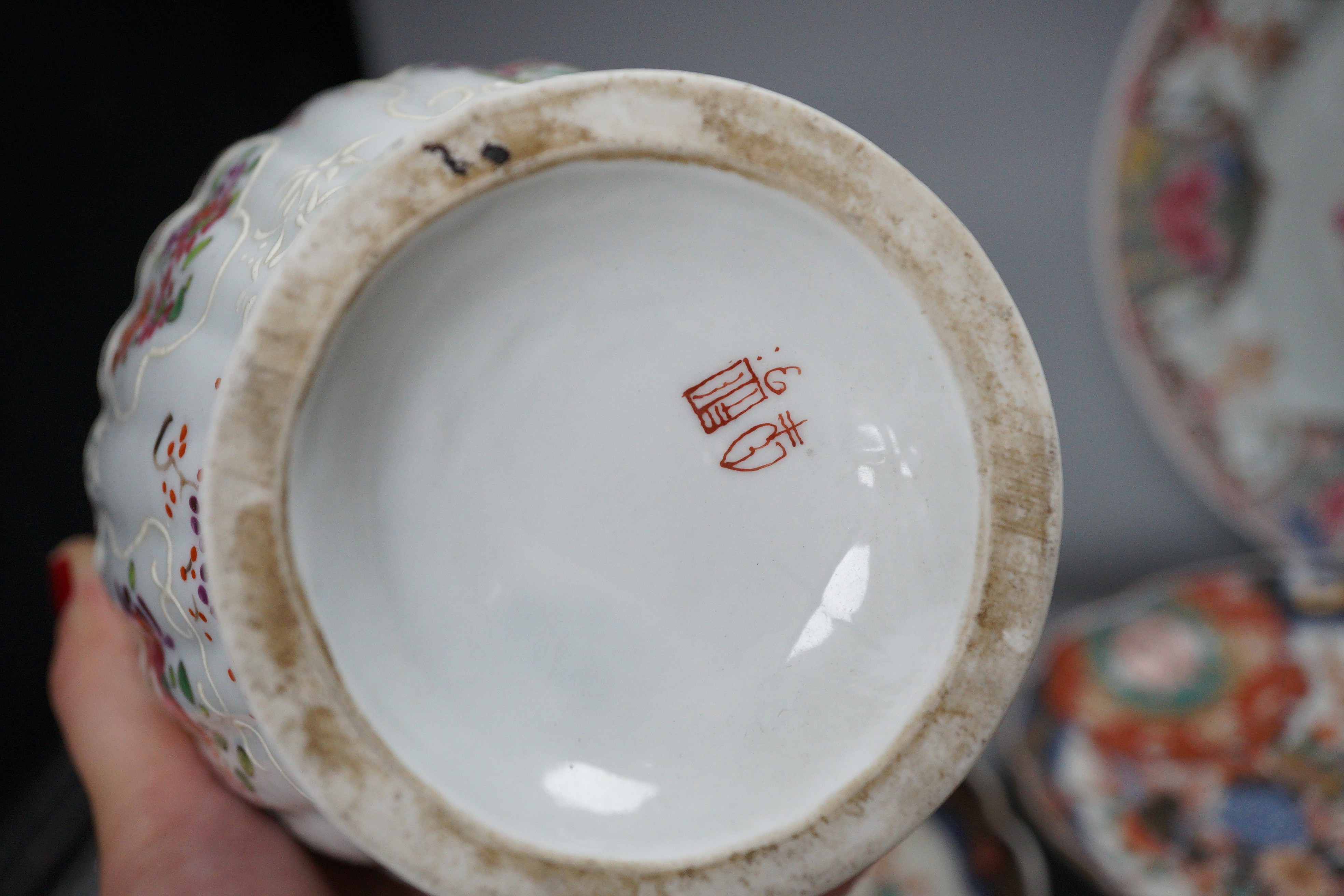 A Samson ovoid armorial jar, a Samson plate, a pair of Imari leaf dishes and three other Chinese/Japanese items